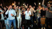 Botellón en la playa.